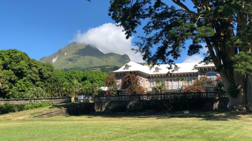 Historic colonial estate with flowering gardens at the foot of Mount Pelée Martinique