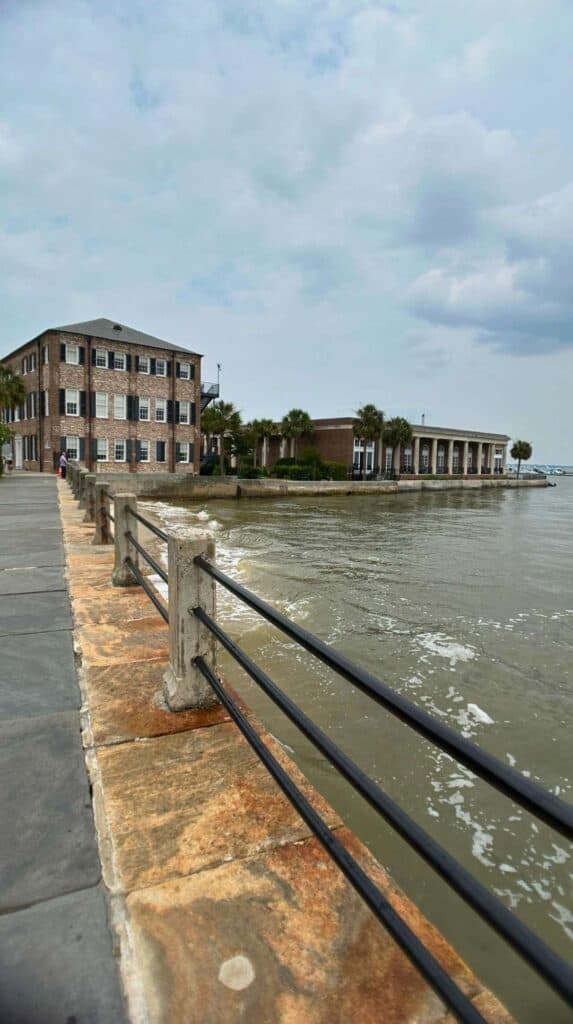 The Battery seawall walking path along the harbor, a lovely setting for a romantic Charleston getaway

