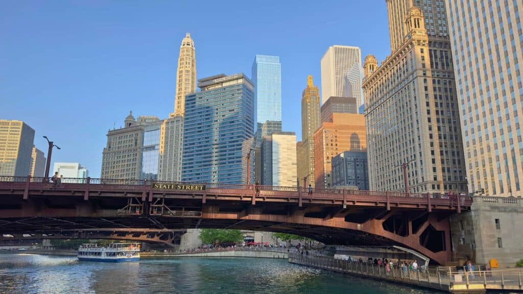 Tour boat passing under State Street bridge on a chicago architecture boat tour navy pier loop