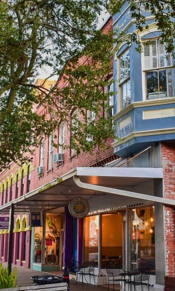 Colorful storefront of Amelia Island Coffee in downtown Fernandina Beach.