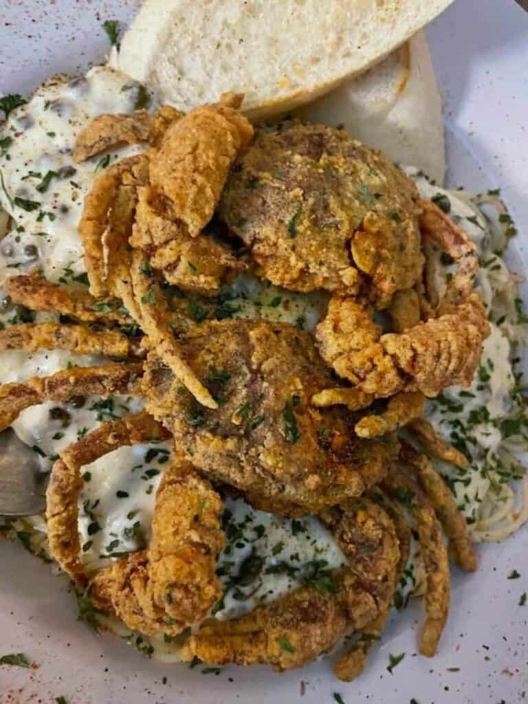 A fried soft shell crab pasta dish at Maison de Lu, one of the more upscale places to eat in Ocean Springs, MS downtown.