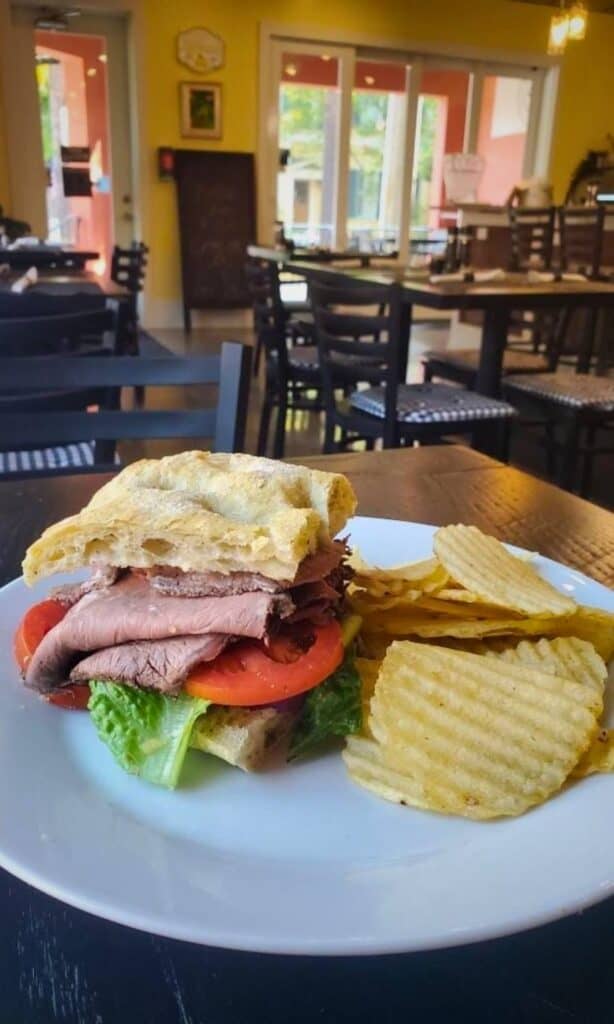 Sandwich and kettle chips served at Twisted Table brunch restaurant.