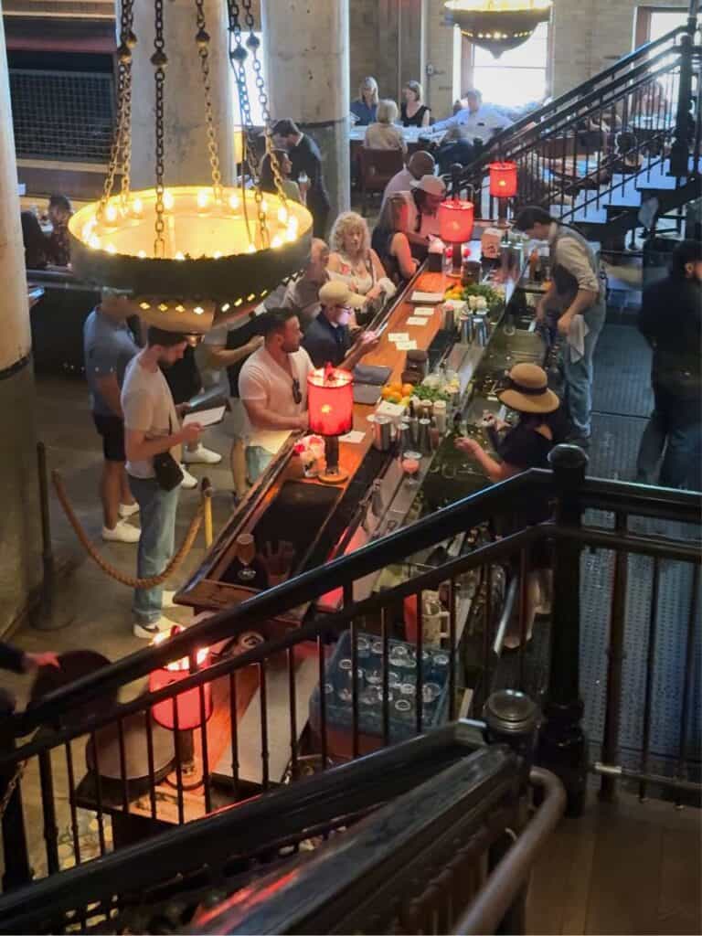 The Sternewirth bar during the Kentucky Derby party at Hotel Emma San Antonio, seen from the mezzanine