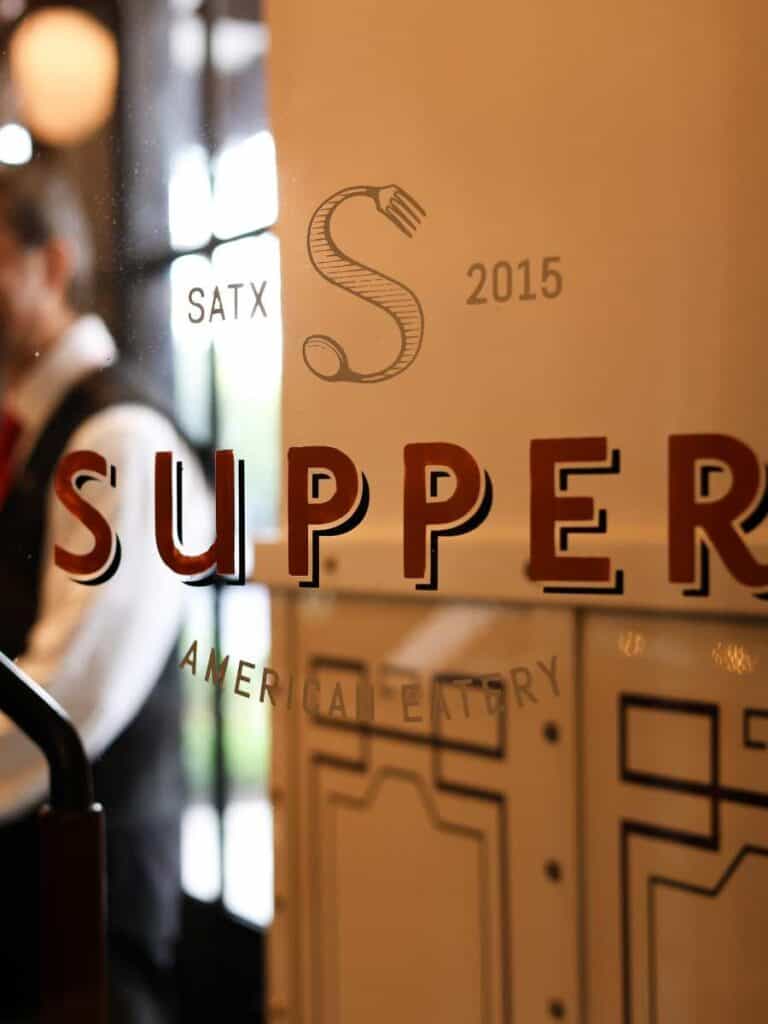 Supper restaurant's etched glass logo at Hotel Emma San Antonio, an American eatery since 2015