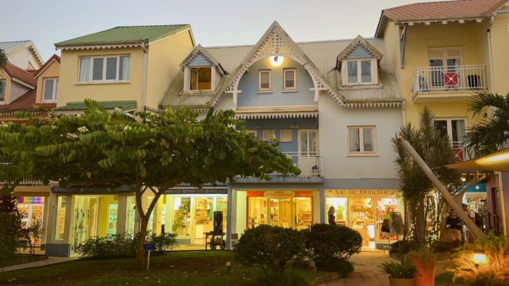 Village Créole lit up at night near the best places to stay in Martinique in Les Trois-Ilets
