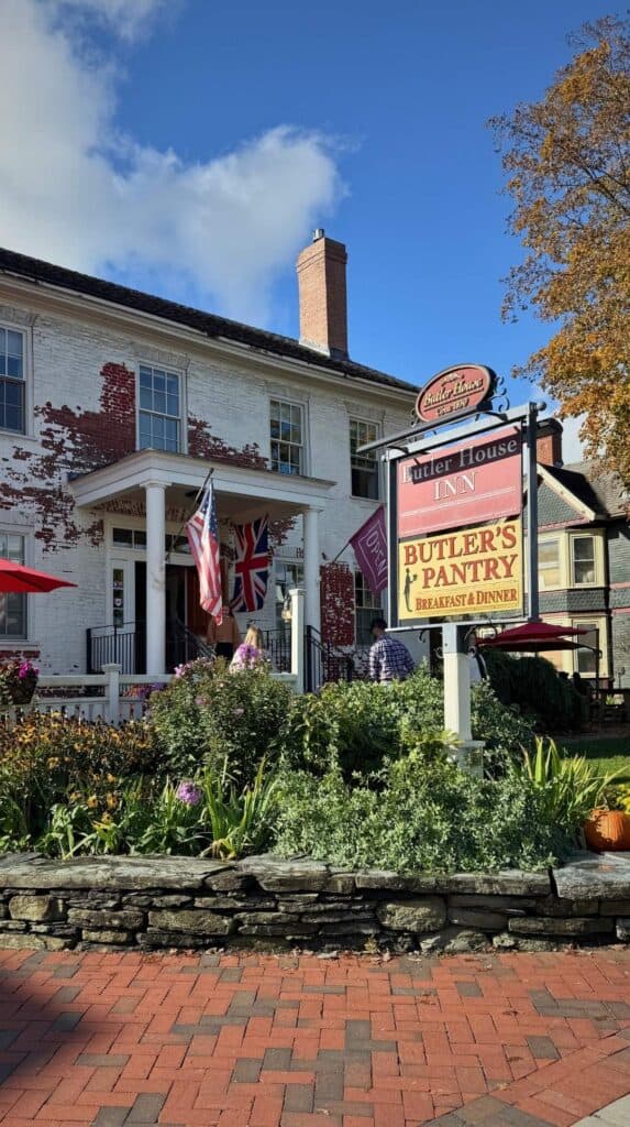 The Butler's Pantry sign marks a historic building in downtown Stowe
