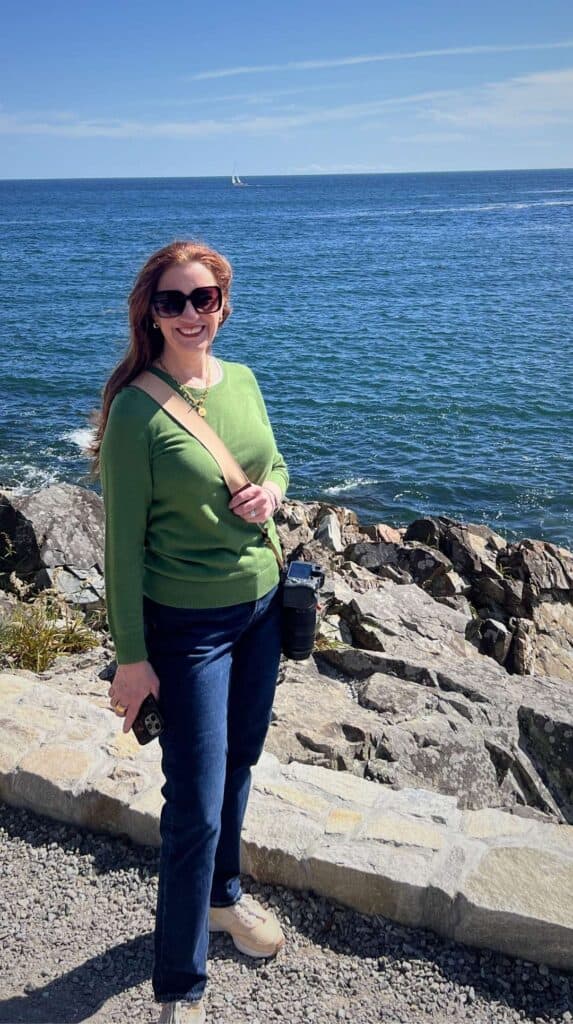 Walking the paved Marginal Way path above the rocky Maine coastline
