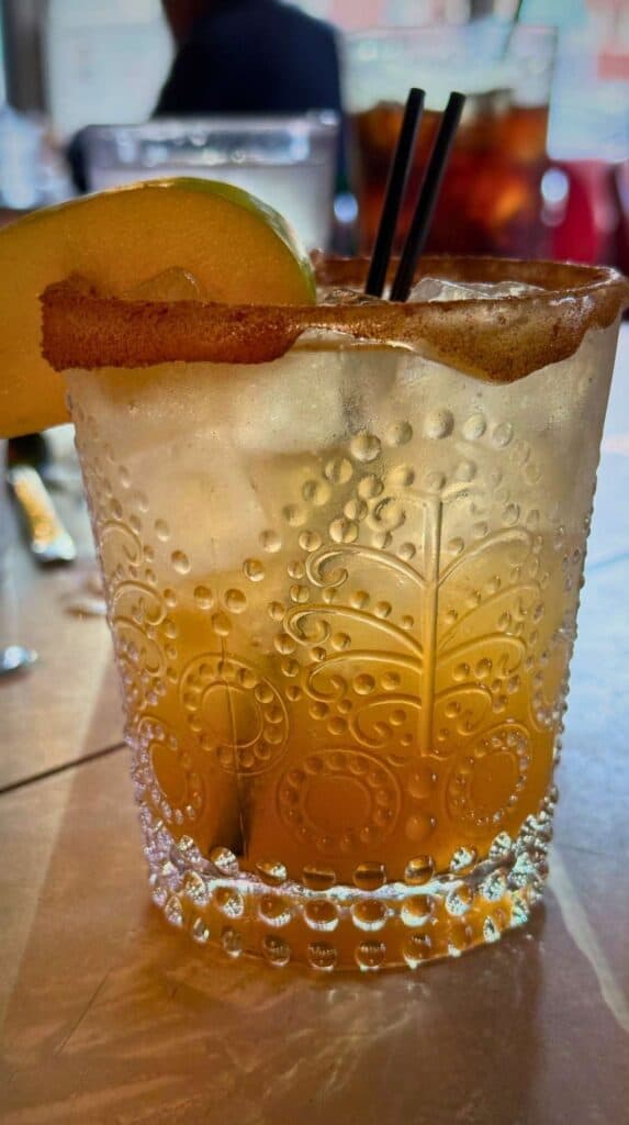 A creative fall cocktail with a cinnamon rim at a Portsmouth breakfast spot

