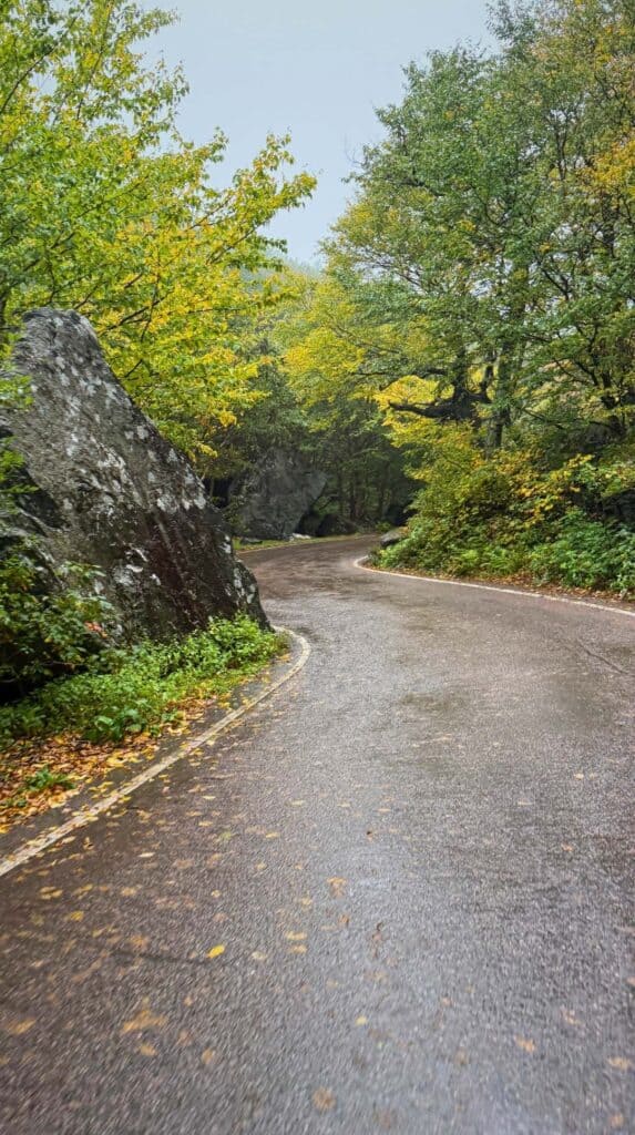 A winding road curves through the tight turns of Smugglers Notch
