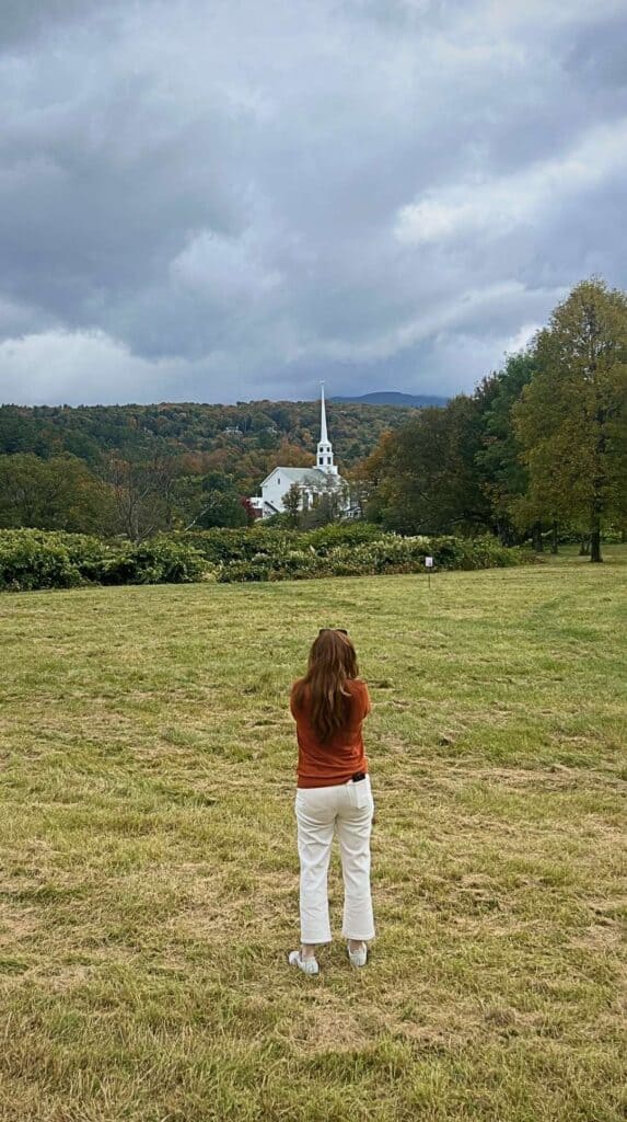 Standing alone in a field framing the iconic Stowe Community Church photo
