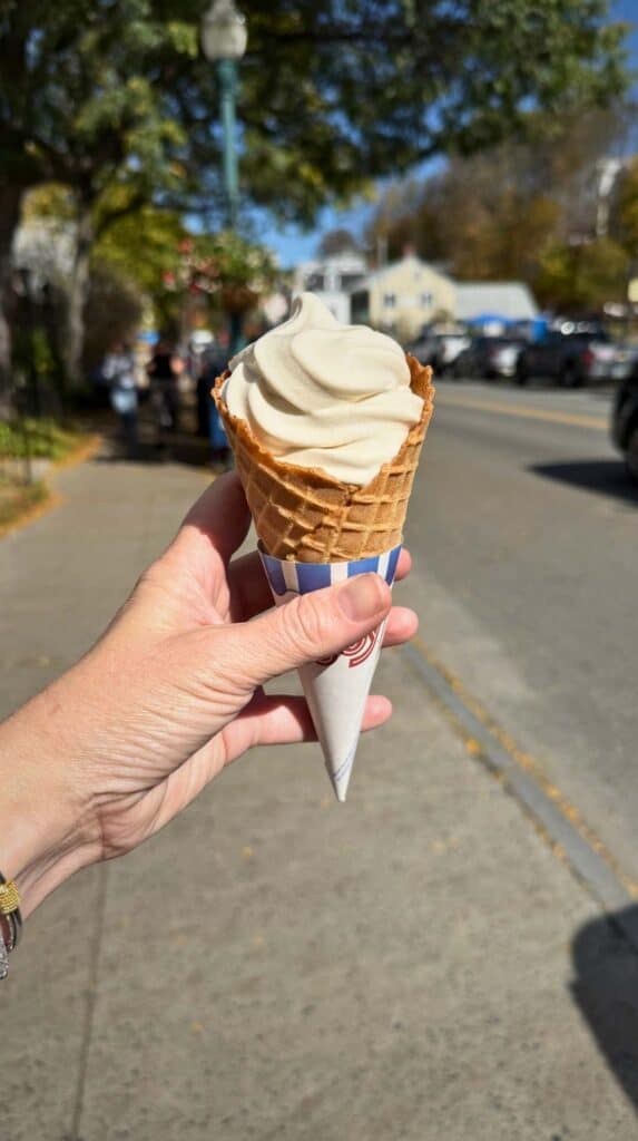 Holding a maple creemee from Woodstock Scoops in Woodstock, Vermont
