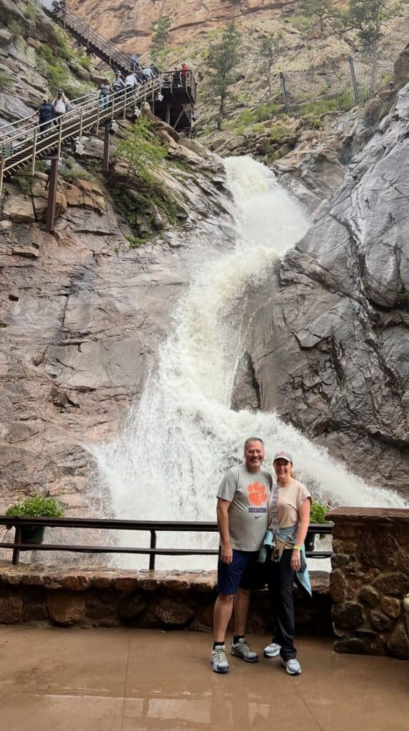 Ashley and Jason at the base of Broadmoor Seven Falls waterfall, the setting for Restaurant 1858