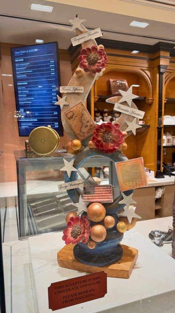 A patriotic chocolate sculpture with stars, flags, and flowers at Cafe Julie's